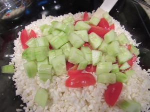Add cucumber and tomatoes